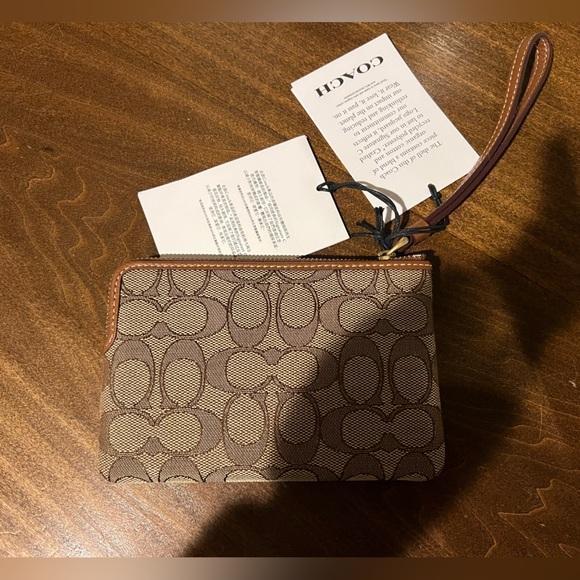 New with tags, never used, Coach Mickey Mouse Wristlet. - Picture 3 of 3